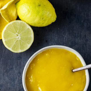 bowl of lime curd with a spoon