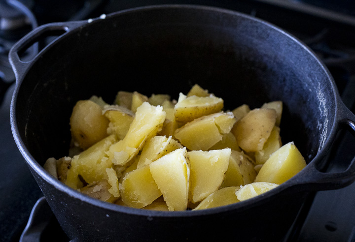 cooked cubed potatoes in a large pot
