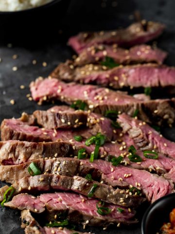 Medium-rare skirt steak cut into thin slices.