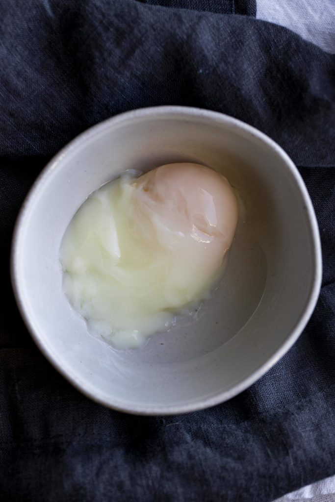 A bowl with a sous vide poached egg.