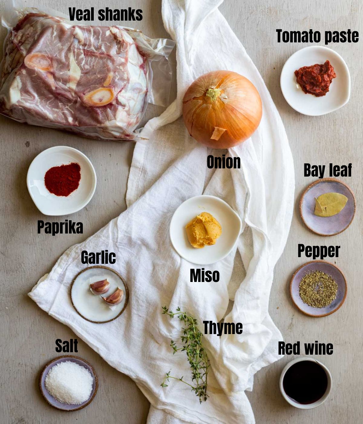 Ingredients to make sous vide osso buco arranged individually and labelled.