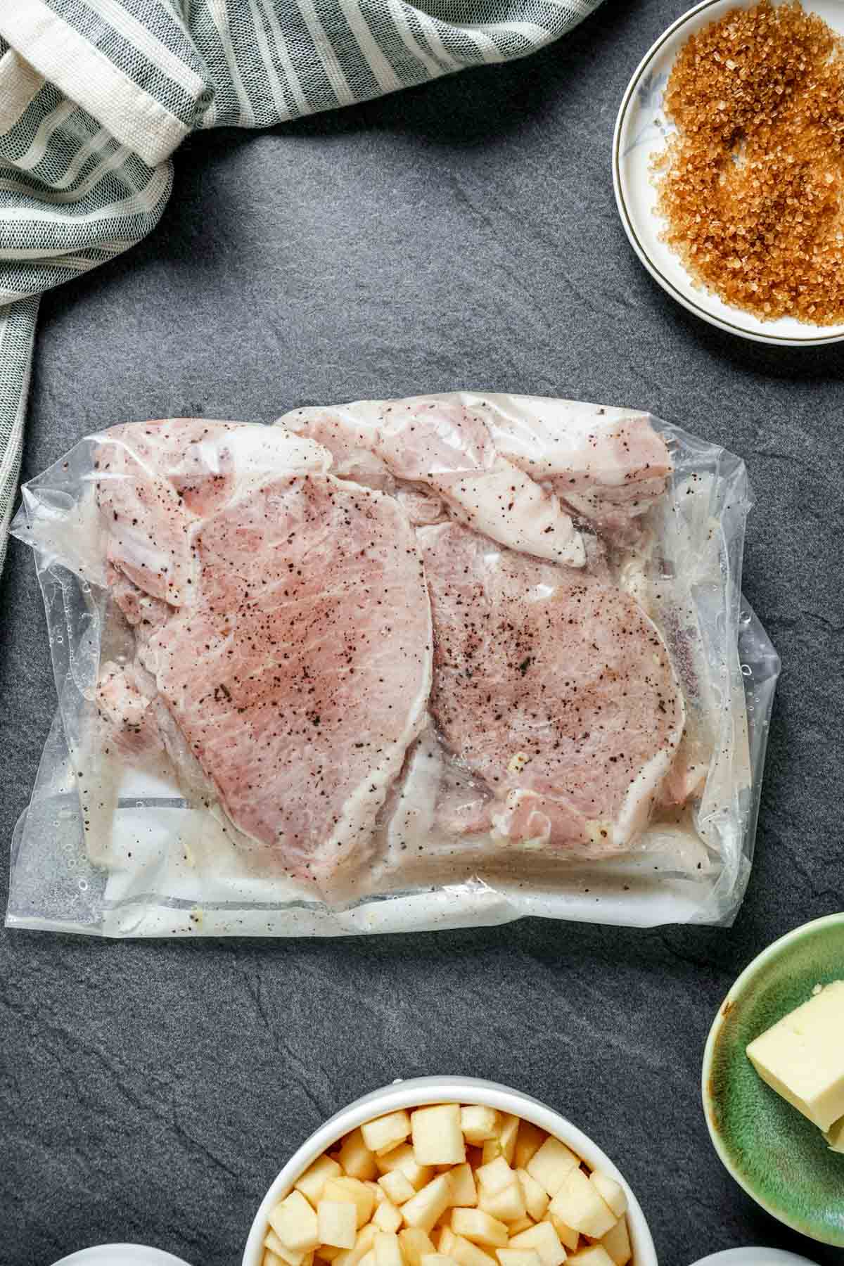 2 pork chops in a vacuum seal bag