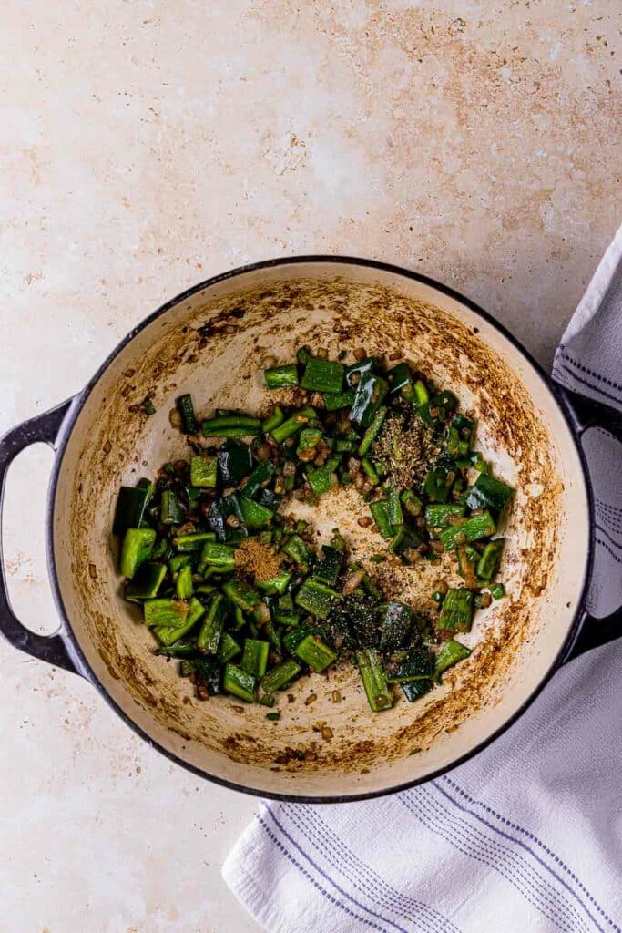 green vegetables being cooked in a pot