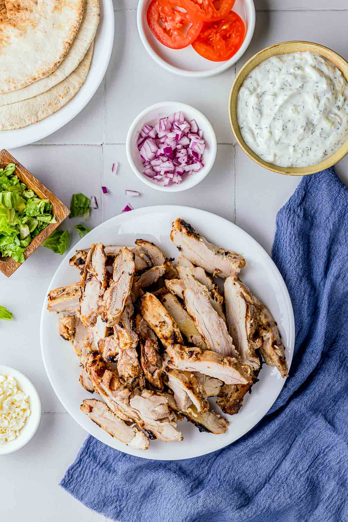 a plate of sliced grilled chicken