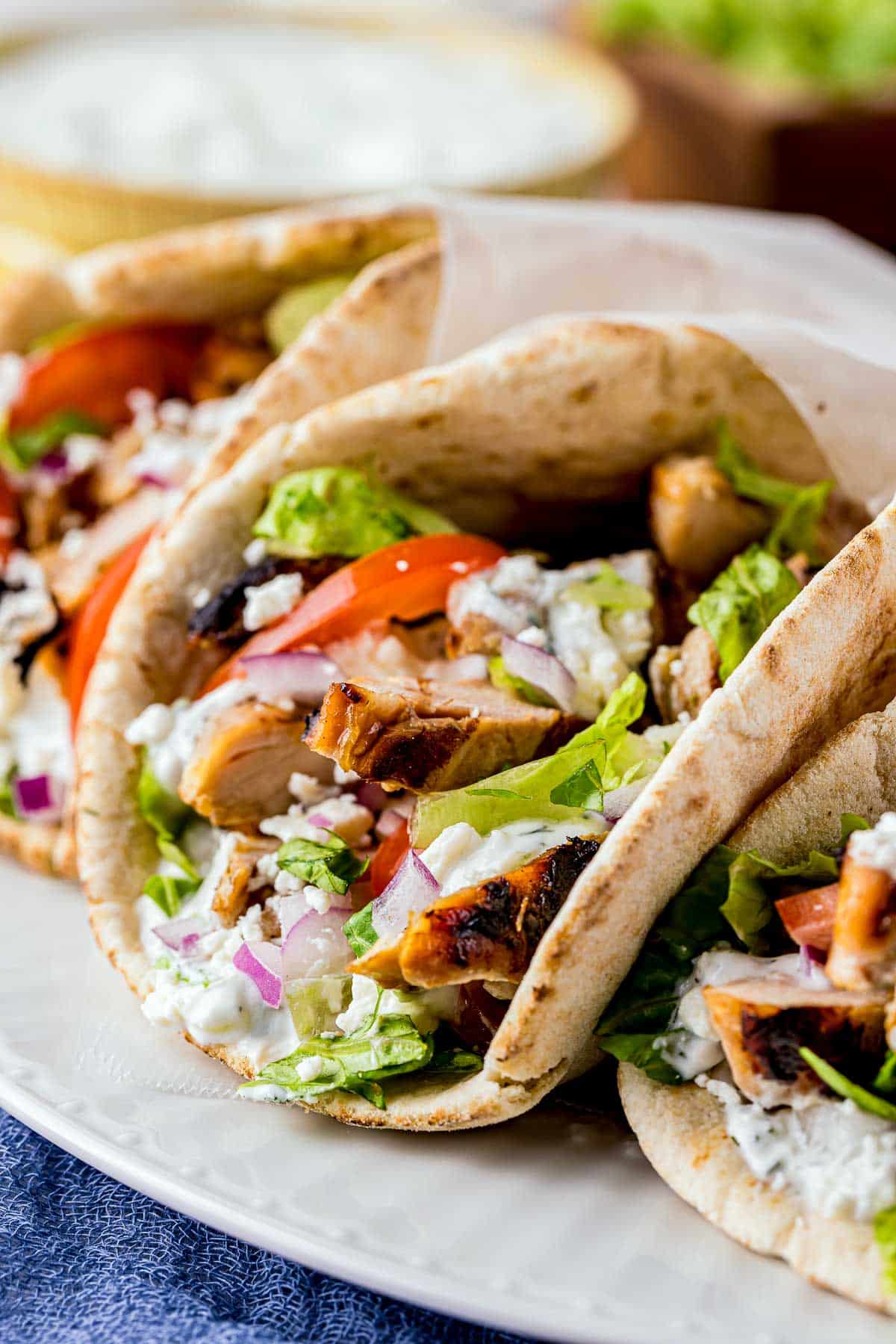 chicken gyro pita with tomatoes and lettuce