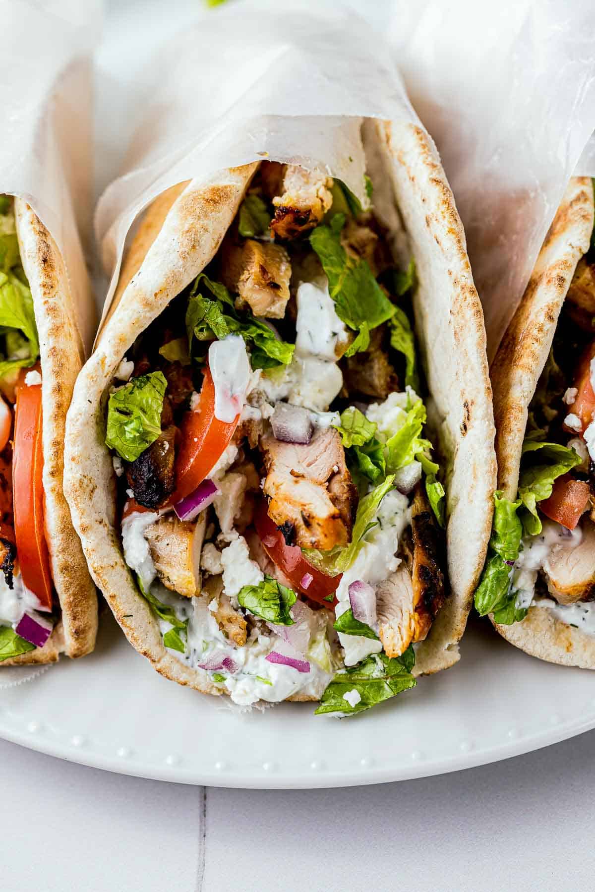 greek gyro with grilled chicken, veggies and tzatziki sauce