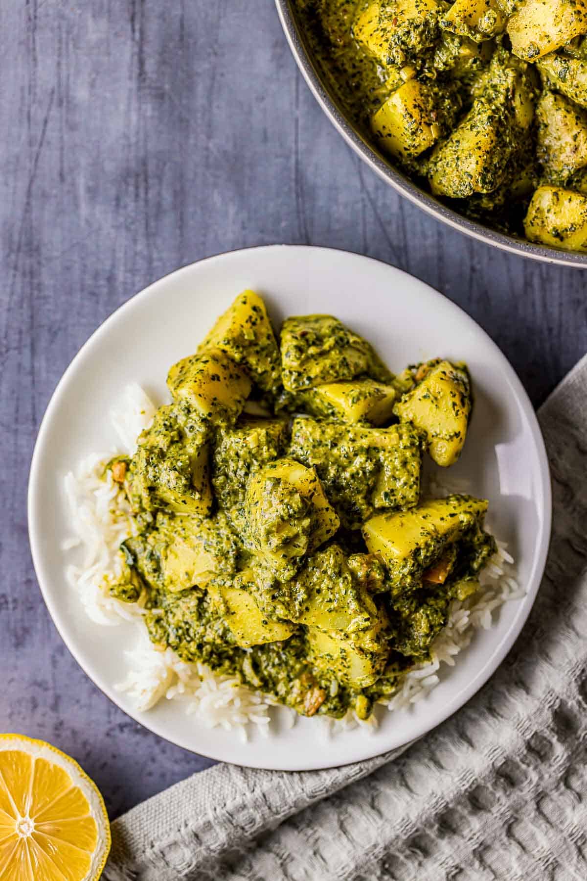 potatoes and spinach over steamed white rice