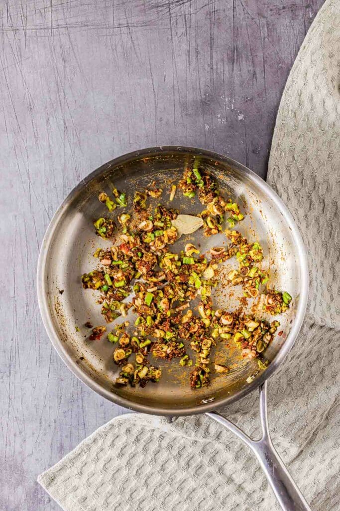 brown paste cooking in a skillet