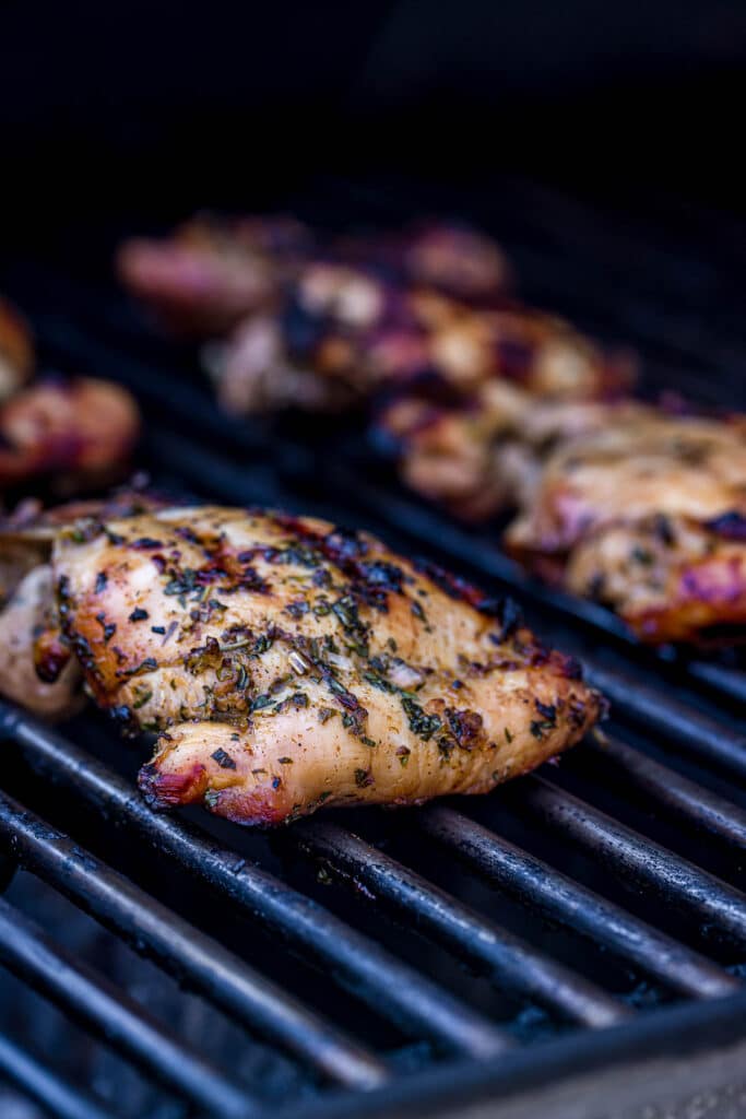 chicken thighs being grilled