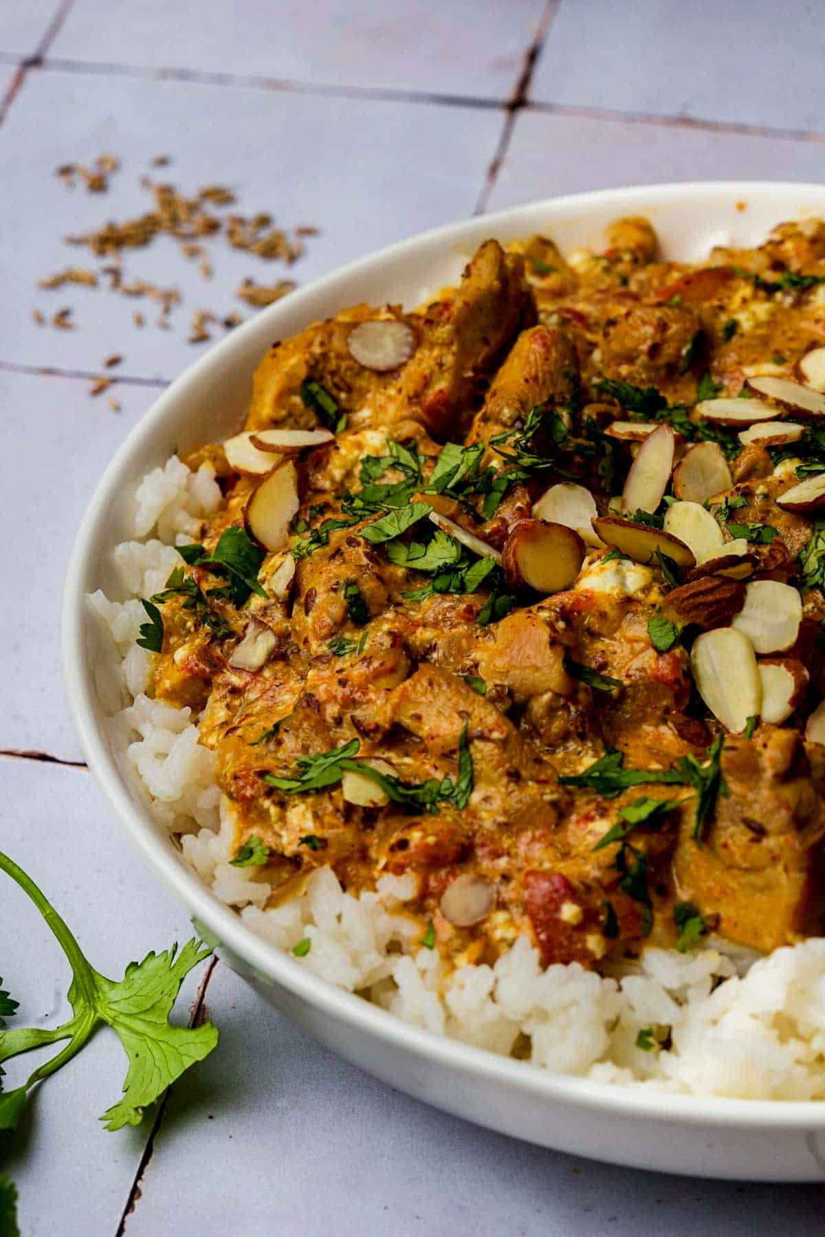 chicken curry with almonds and cilantro.