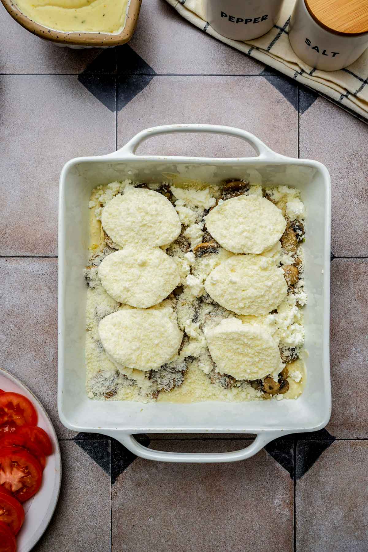 layer for mushroom lasagna in a baking dish.