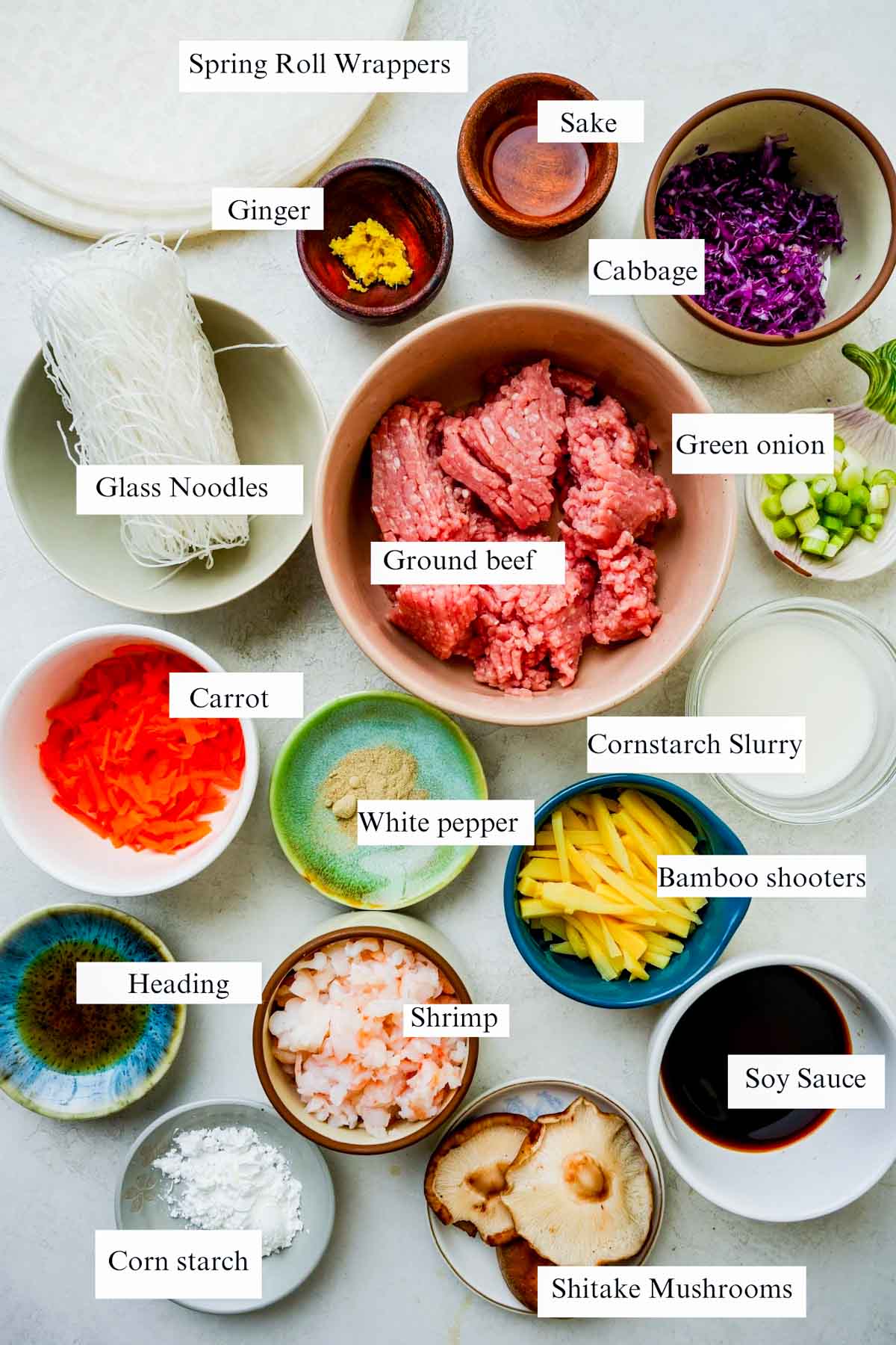 ingredients for harumaki on a white surface.