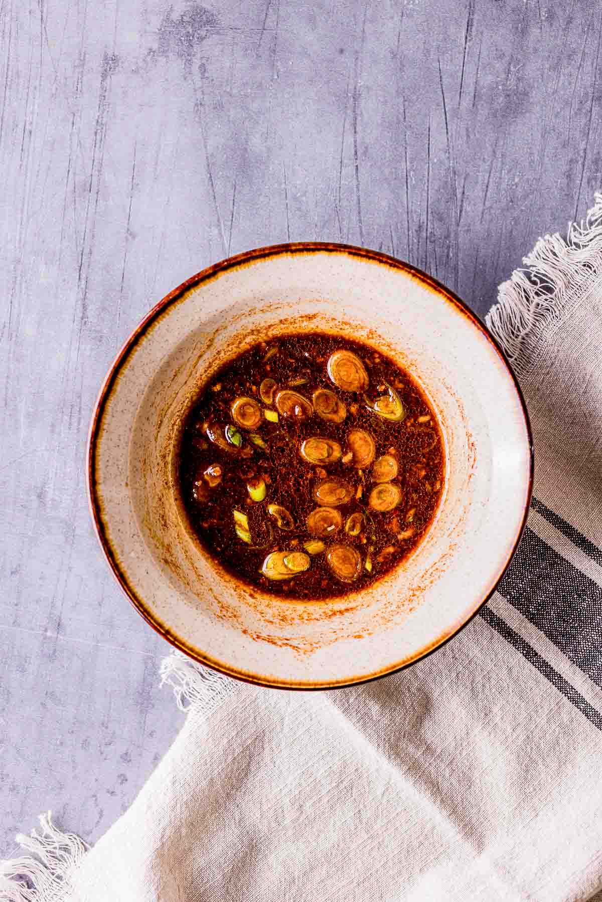 a borwn sauce in a bowl.