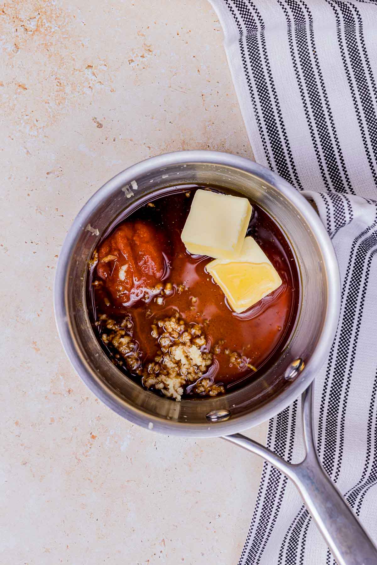 butter and sauce ingredients in a saucepan.