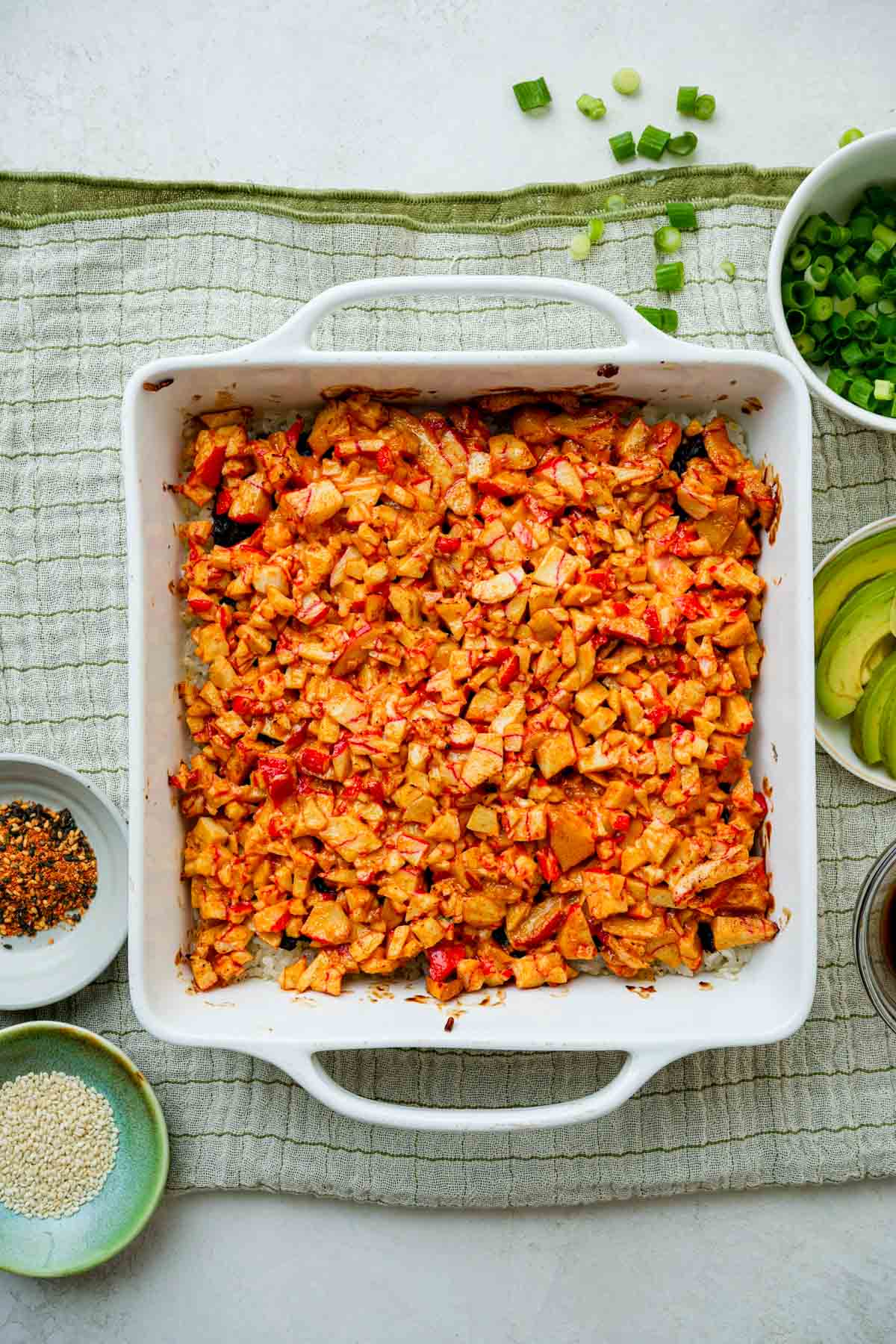 sushi crab mix baked in a square dish.