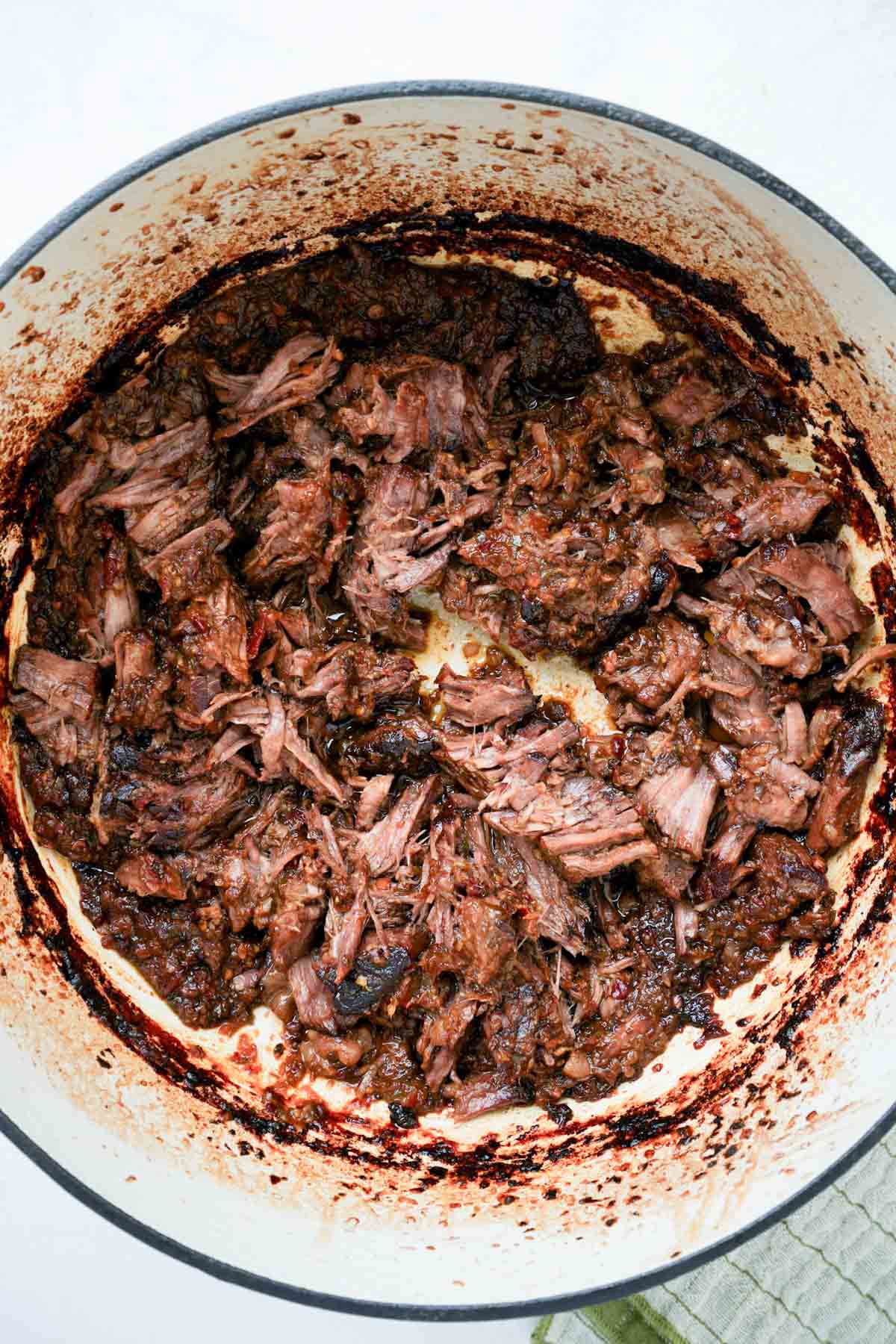 shredded beef in a pot.