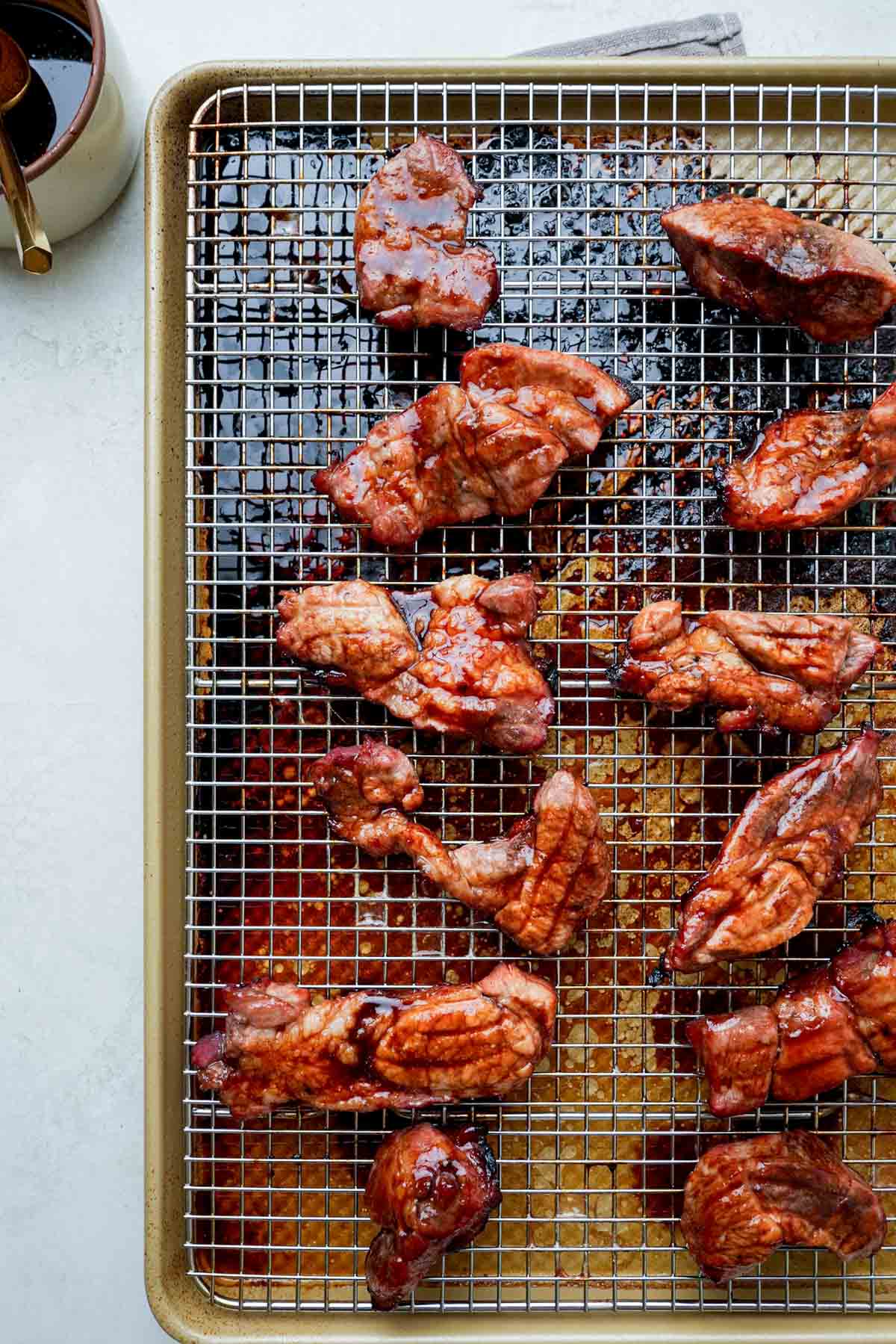 crispy roasted pork on a wire baking rack.