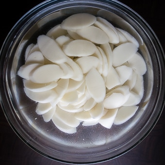 korean rice cakes soaking in a bowl.