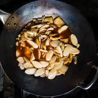 making tteokbokki in a wok.