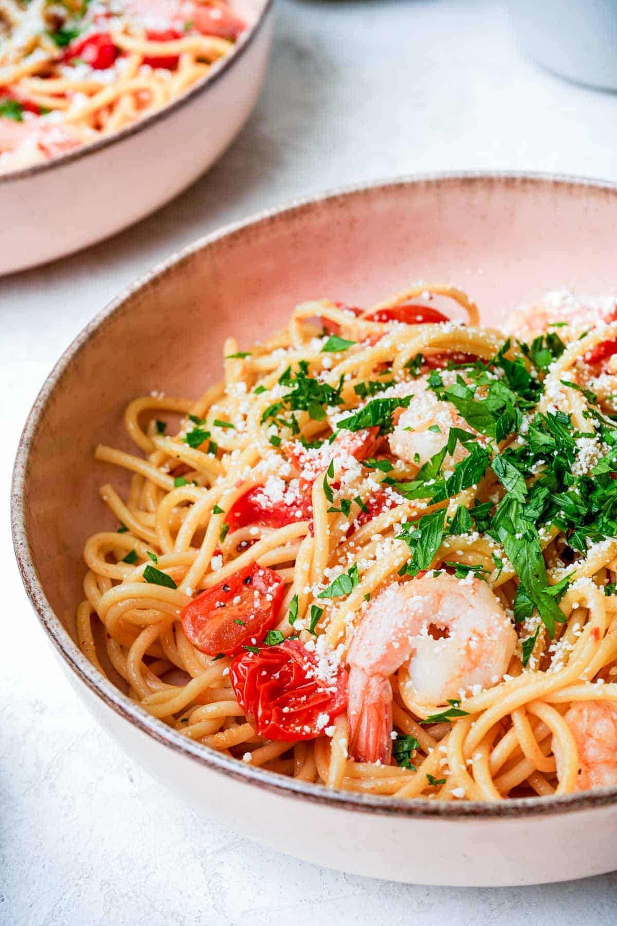 butter garlic spaghetti with shrimp and parsley.