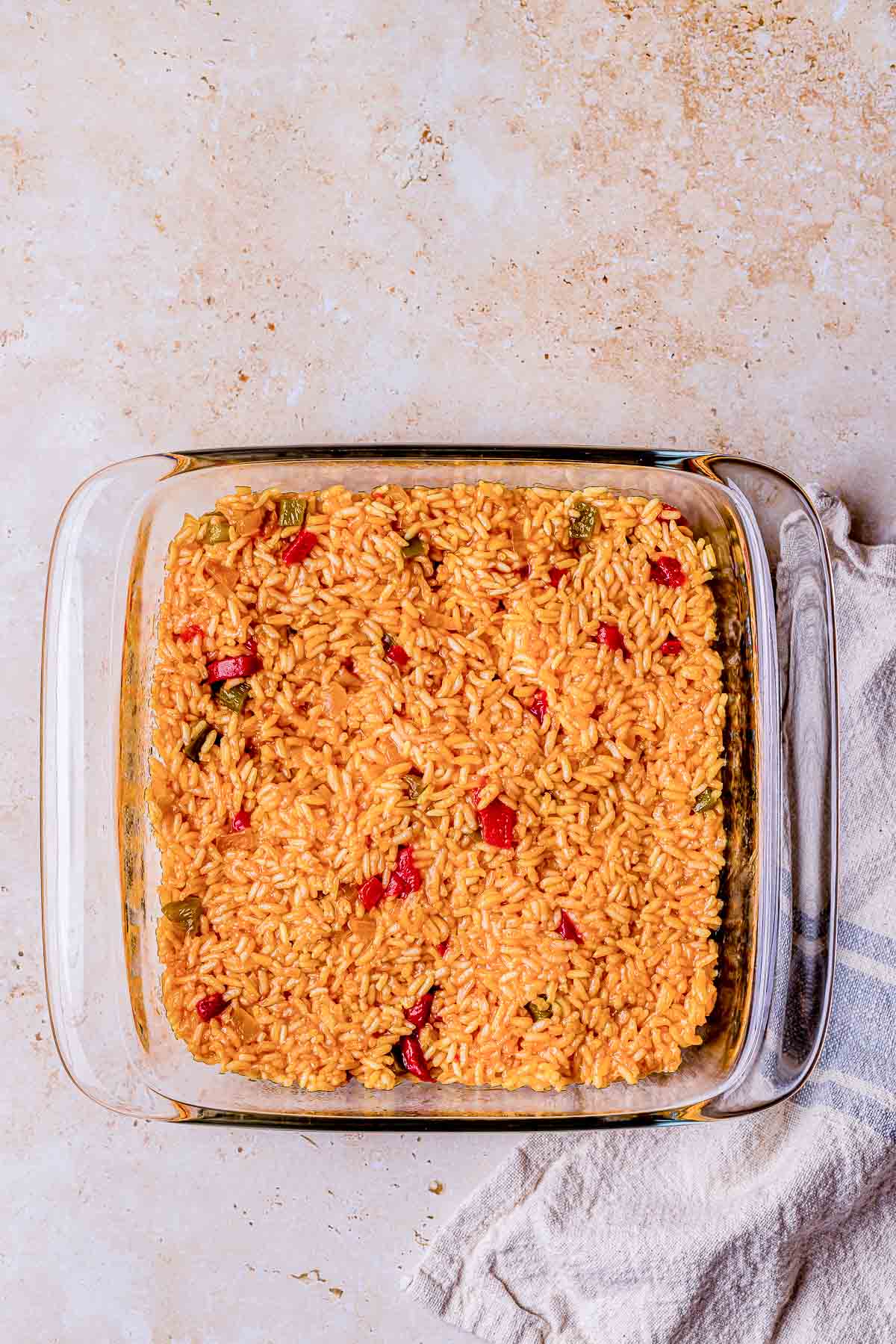 yellow rice in a baking dish.