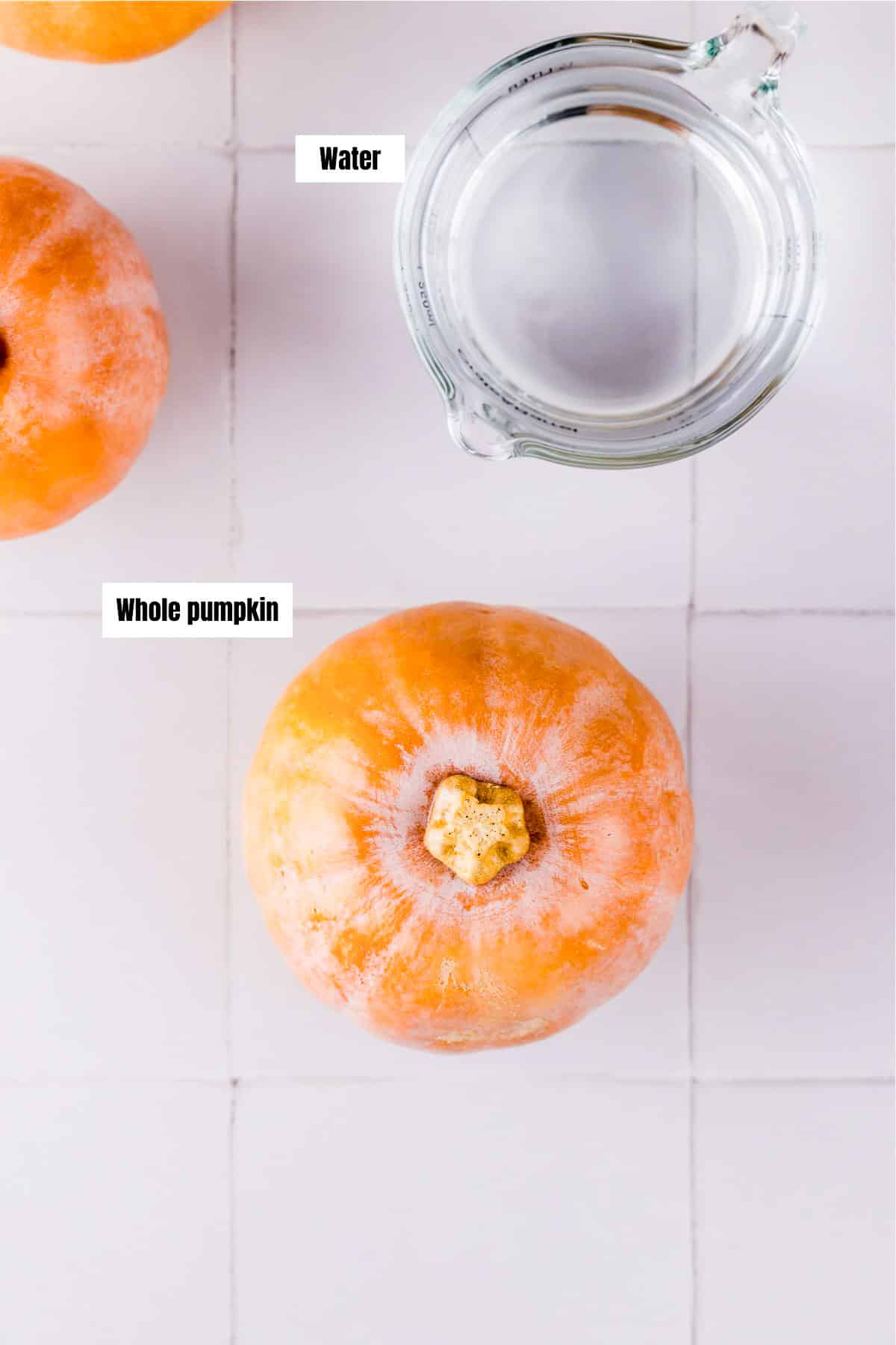 ingredients for crock pot pumpkin puree on a white board.