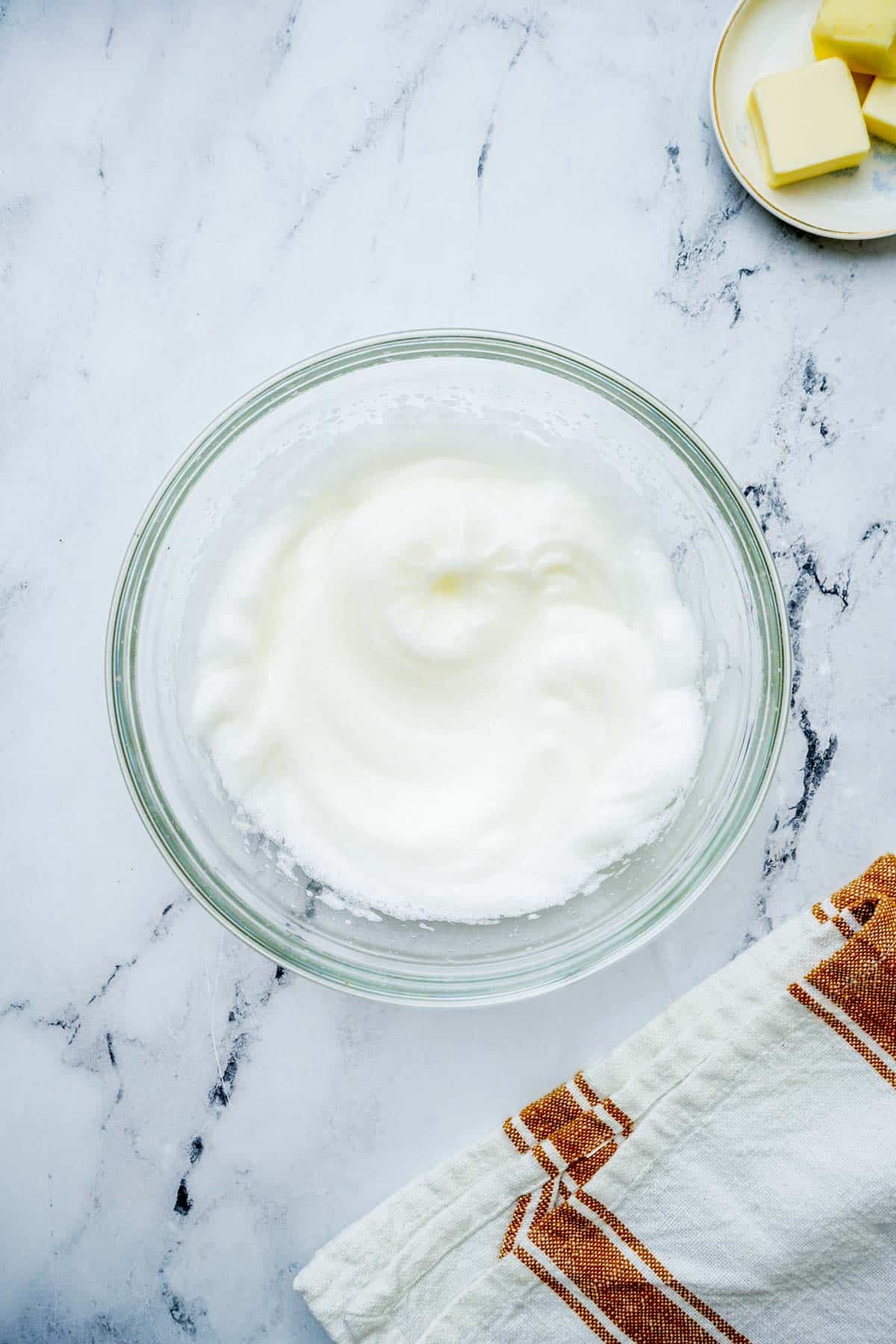 fluffy egg whites in a bowl.