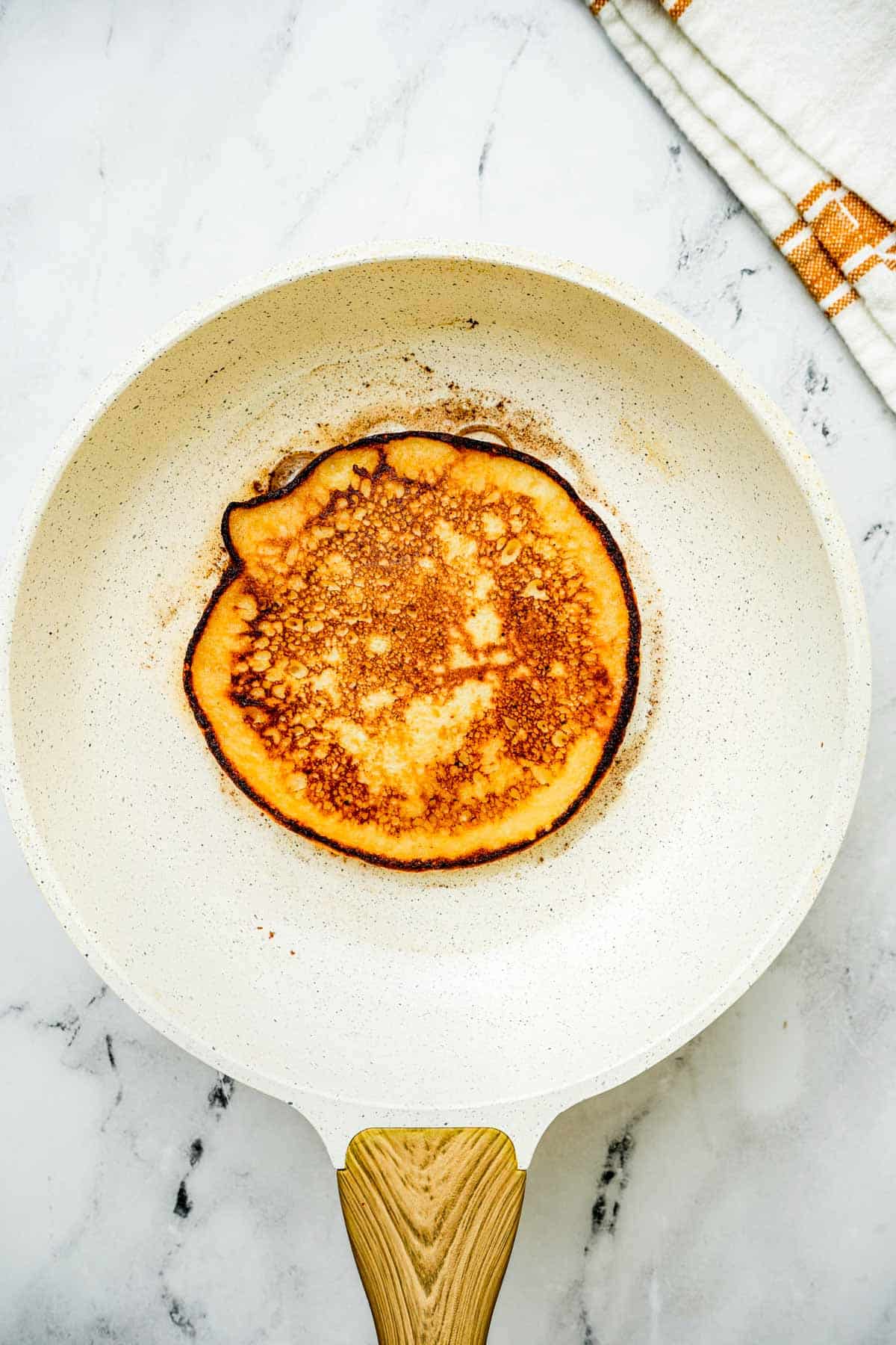 pancake browning in a skillet.