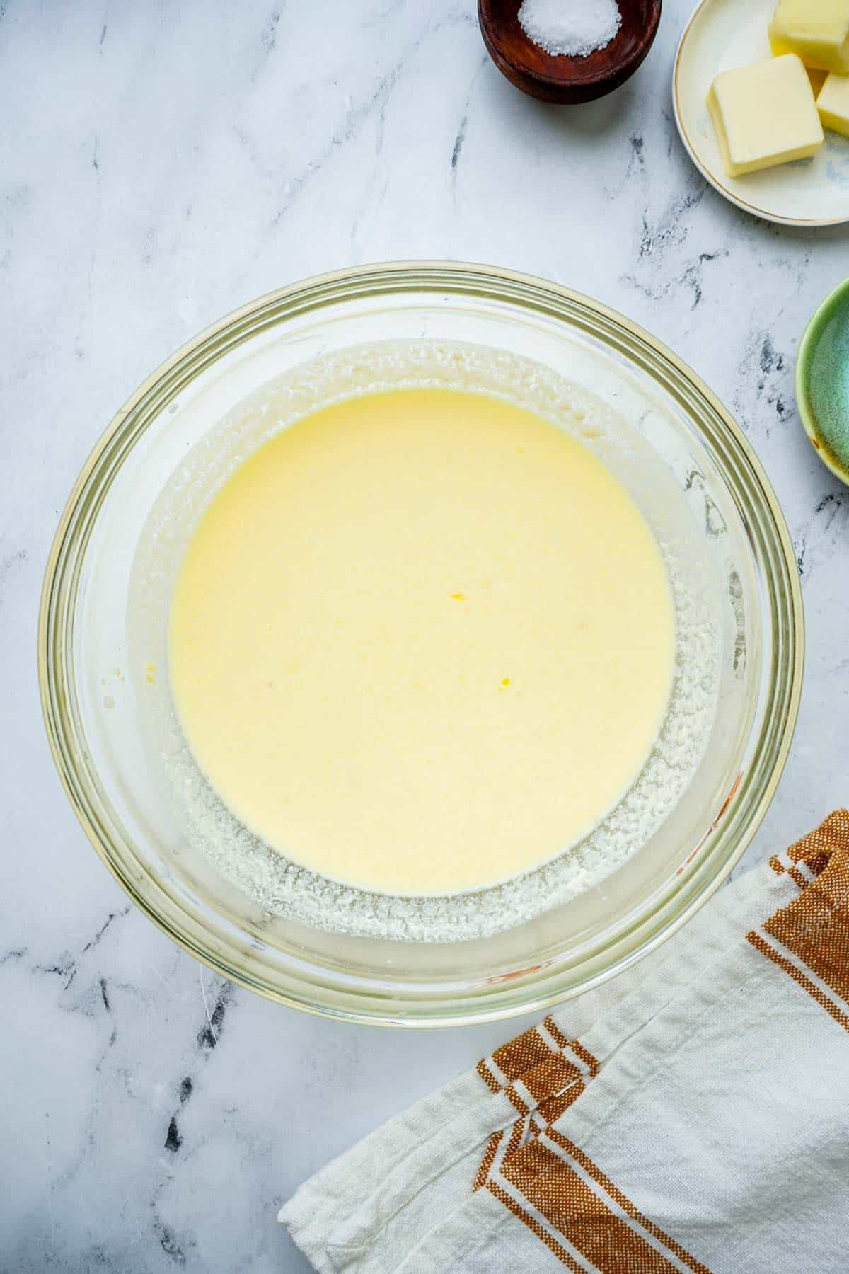 yellow liquid in a glass bowl.