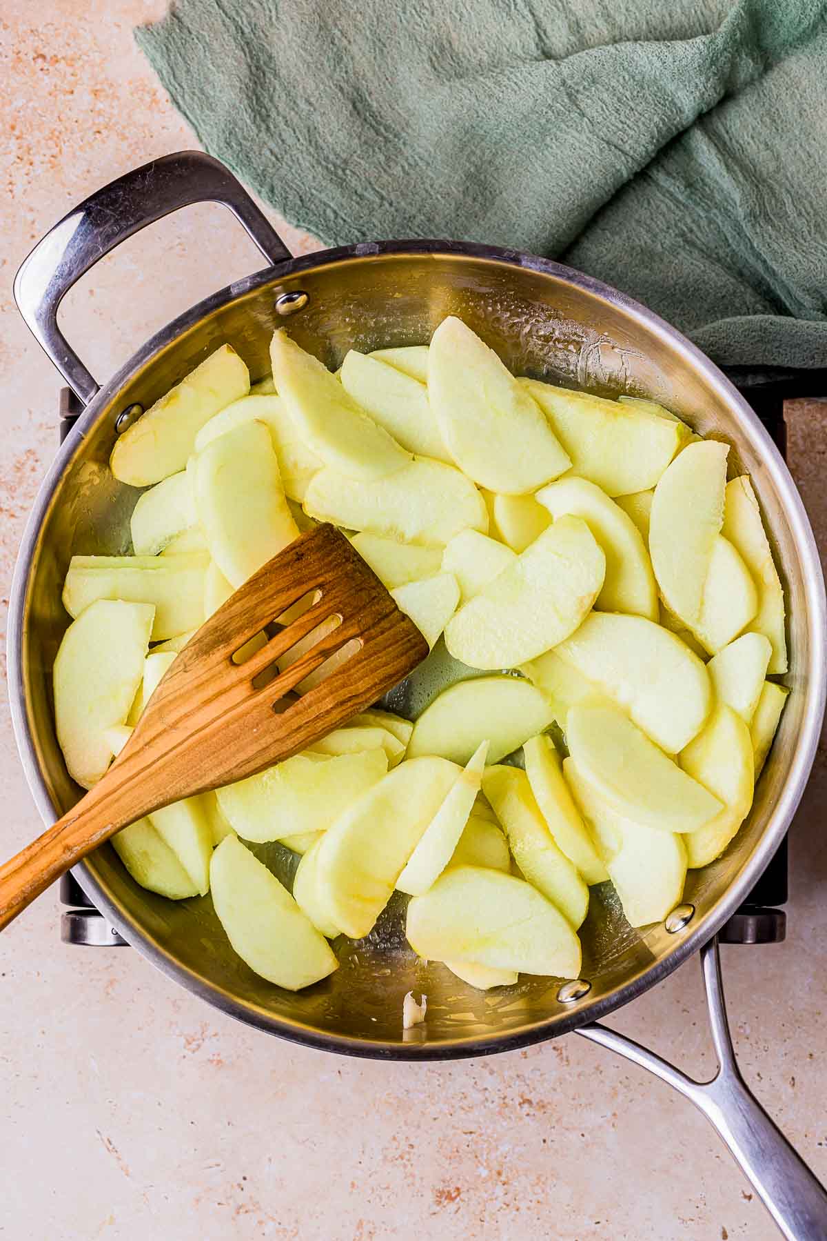 apples cooking in a skillet.