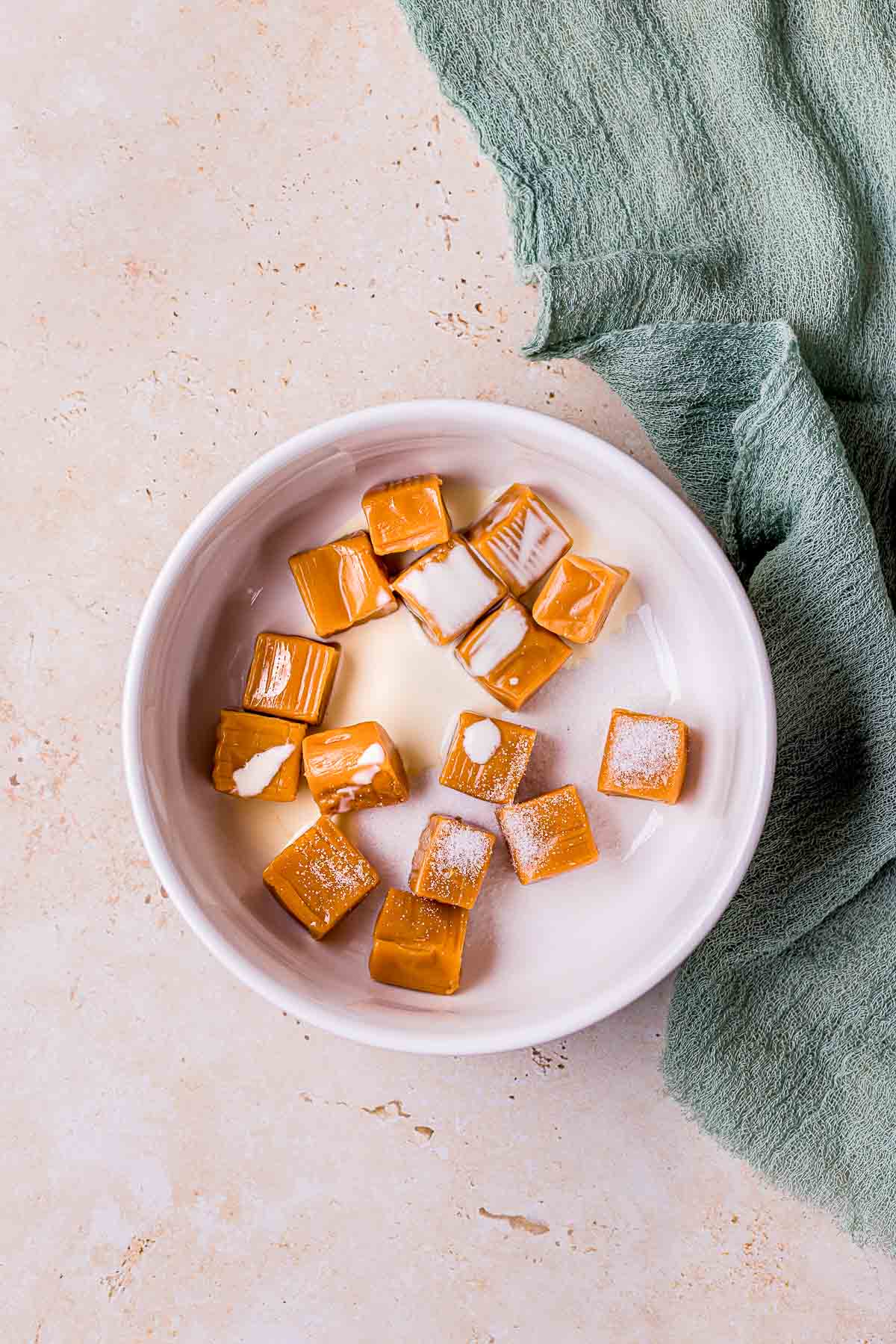 square caramels and salt in a bowl.