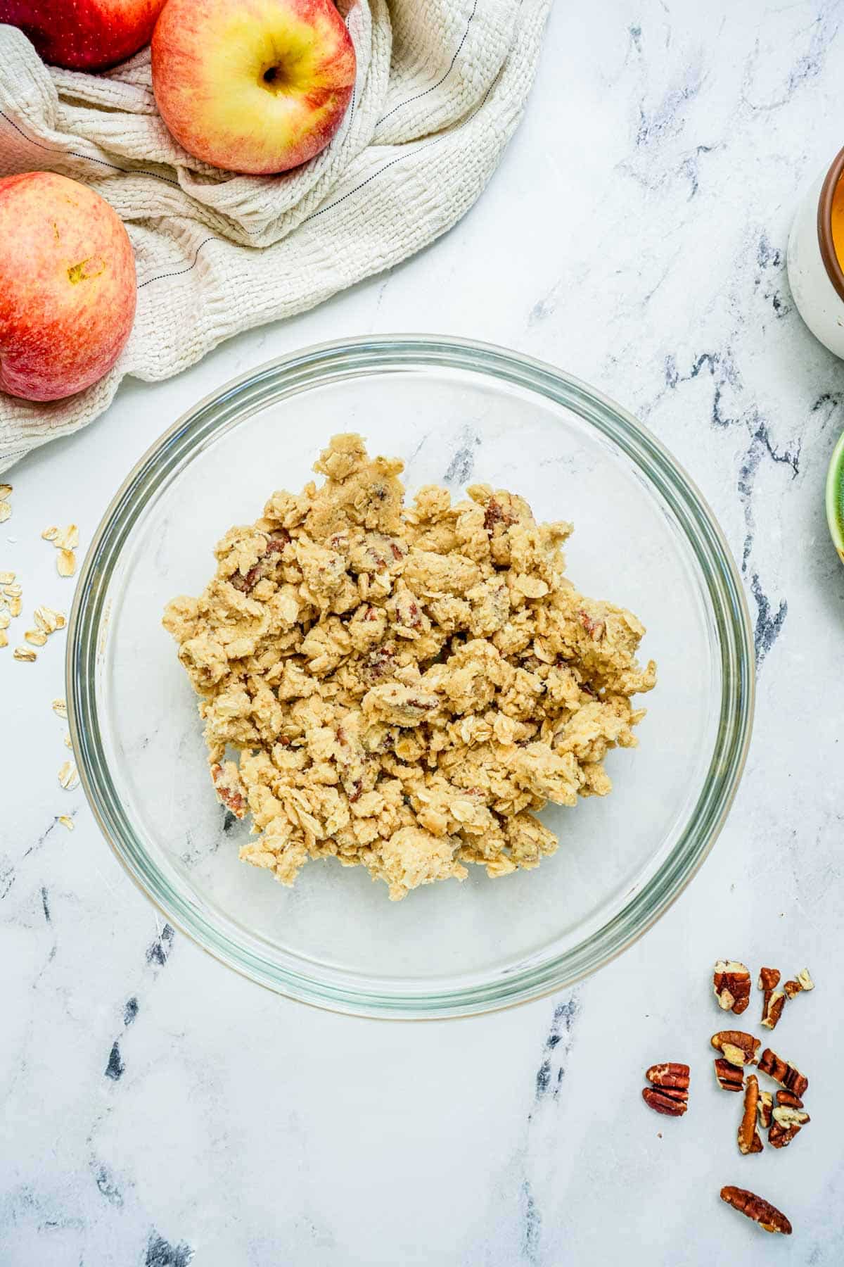 apple crisp topping in a bowl before cooking.