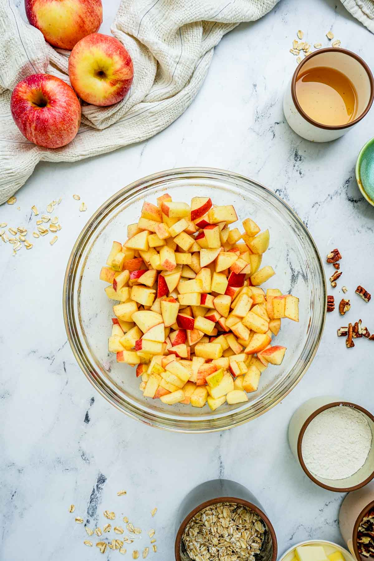 chopped apples in a glass bowl.