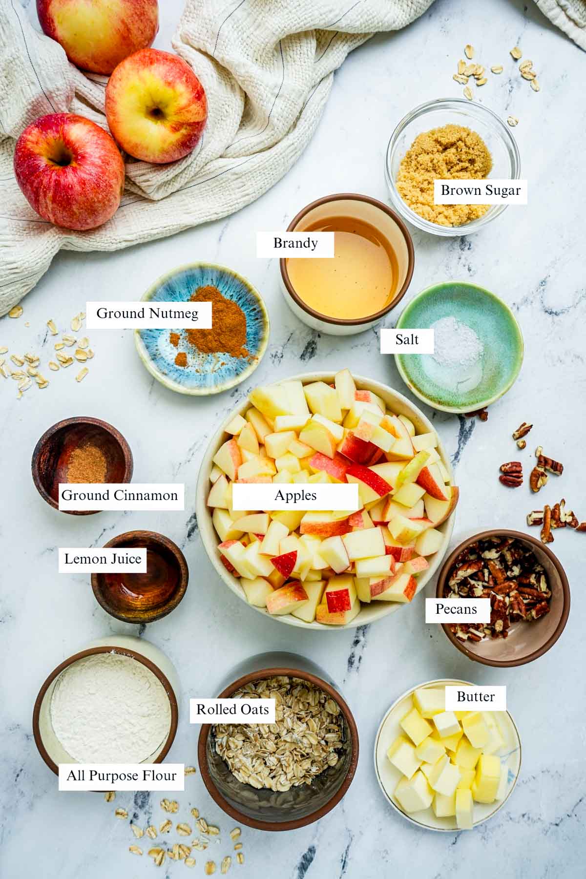 ingredients for apple crisp on a surface with text overlay.