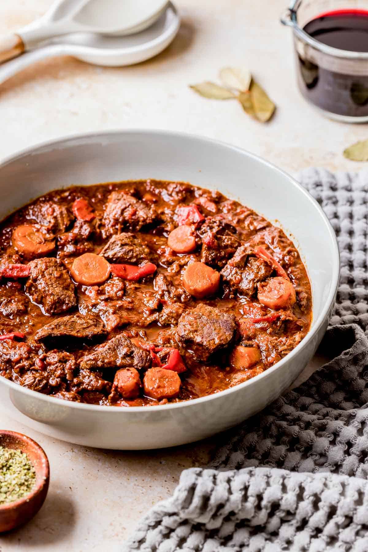 a bowl of german goulash in a pot.